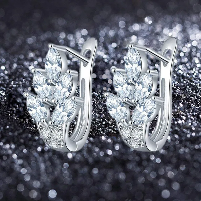 Earrings Yellow Chimes Kairangi Crystal Earrings for Women Leafy Shaped Rhodium Plated White Crystal Clip On Stud Earrings for Women and Girls Earrings Yellow Chimes Kairangi Crystal Earrings for Women Leafy Shaped Rhodium Plated White Crystal Clip On Stud Earrings for Women and Girls