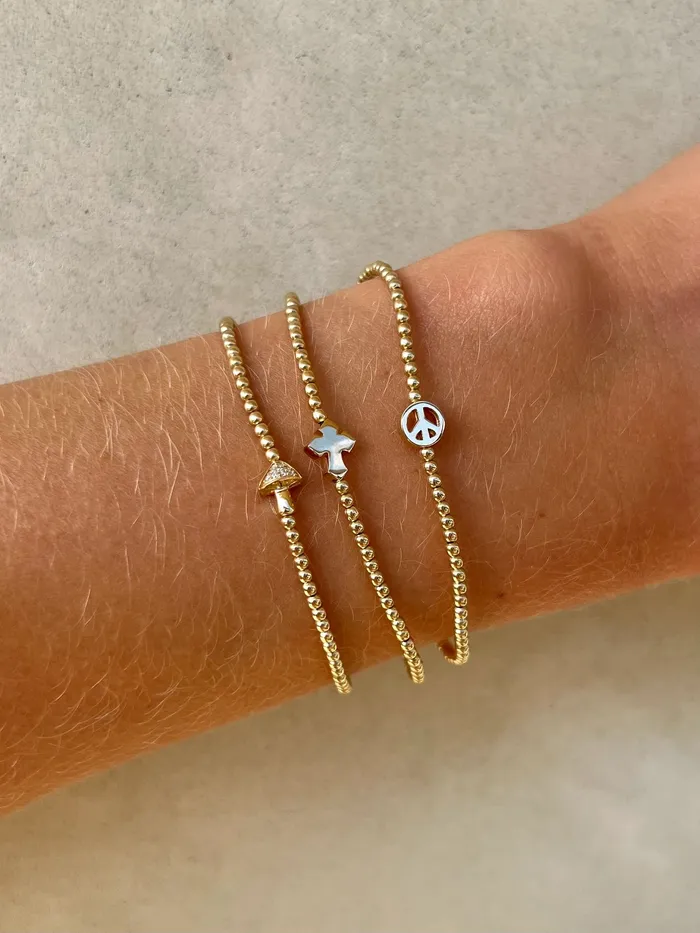 Karen Lazar Bracelets 2mm Signature Bracelet With 14K Peace Sign Bead Karen Lazar Bracelets 2mm Signature Bracelet With 14K Peace Sign Bead