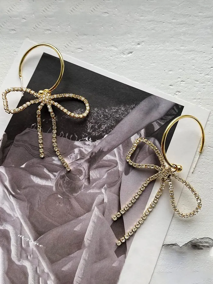 Yellow Chimes Earrings for Women and Girls Drop Earrings for Girls Gold Toned Crystal Studded Bow Designed Drop Earrings Birthday Gift for girls and women Anniversary Gift for Wife Yellow Chimes Earrings