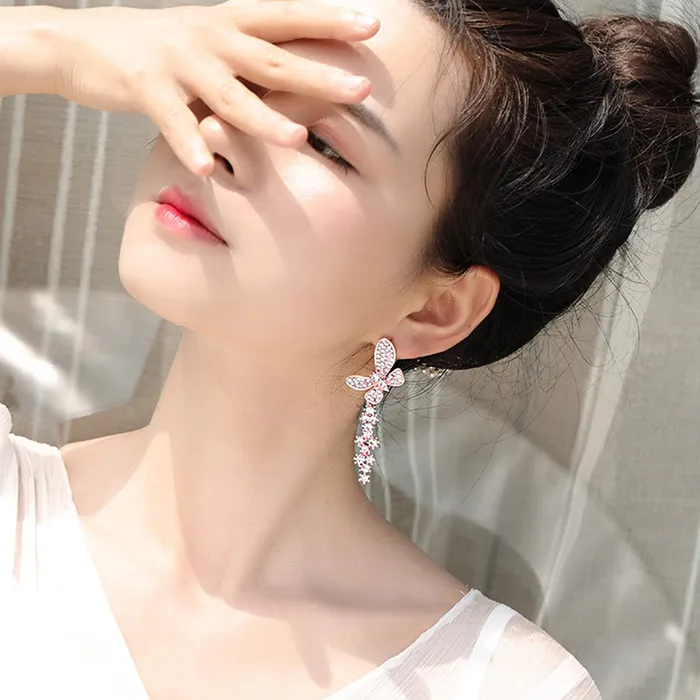 Yellow Chimes Earrings For Women Gold Tone Butterfly Shaped Crystal Studded Dangler Earrings For Women and Girls Yellow Chimes Necklaces