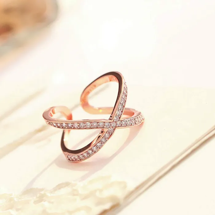 Yellow Chimes Earrings Yellow Chimes Exclusive Italian Design Luxurious Criss Cross Studded Cubic Zirconia Rose Gold Plated Stylish Rings for Women and GirlsAdjustable