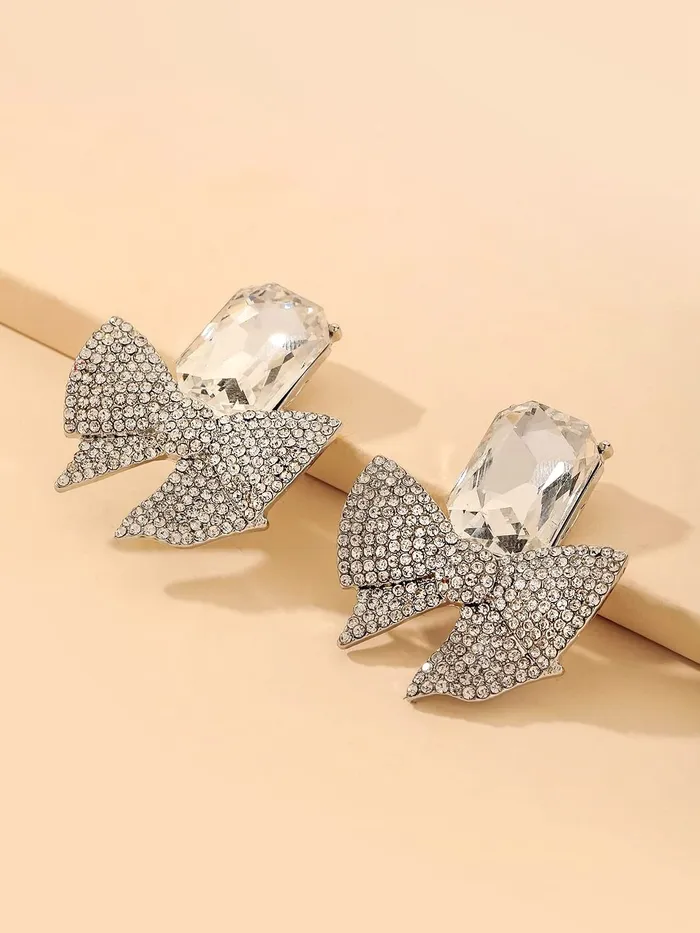 Yellow Chimes Necklaces Yellow Chimes Earrings For Women Silver Tone Crystal Studded Bow Knot Shape Stud Earrings For Women and Girls