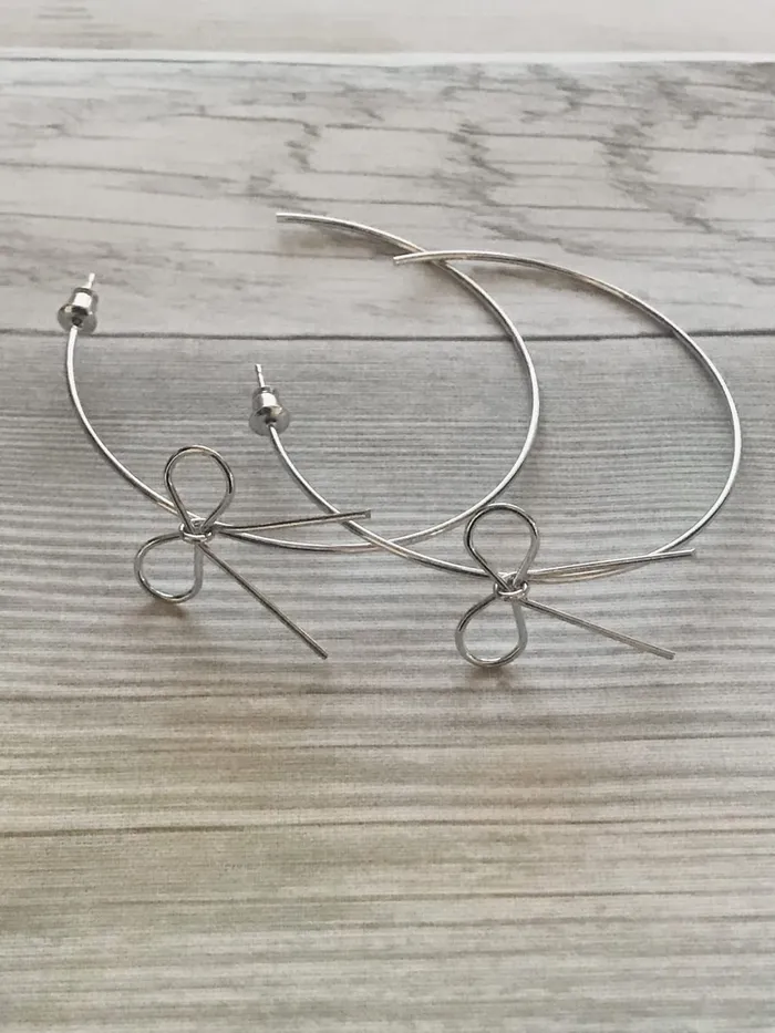 Yellow Chimes Yellow Chimes Earrings for Women and Girls Hoop Earrings for Girls Silver Toned Bow Designed Hoop Earrings Birthday Gift for girls and women Anniversary Gift for Wife Necklaces