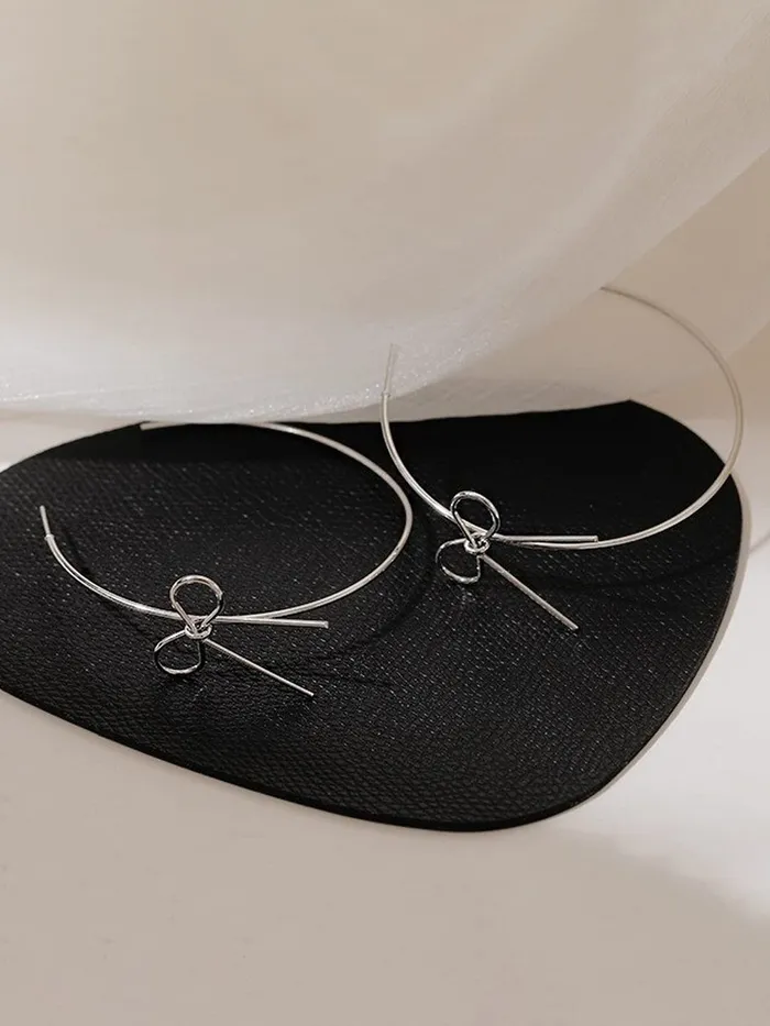 Yellow Chimes Yellow Chimes Earrings for Women and Girls Hoop Earrings for Girls Silver Toned Bow Designed Hoop Earrings Birthday Gift for girls and women Anniversary Gift for Wife Necklaces