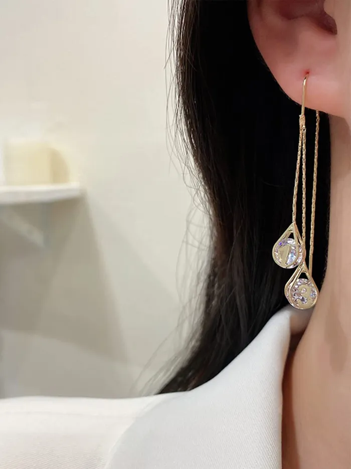 Yellow Chimes Yellow Chimes Earrings For Women Gold Toned Crystal Studded Tear Drop Shape Chain Tassel Dangler Earrings For Women and Girls Necklaces