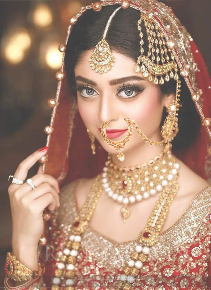Yellow Chimes Yellow Chimes Traditional Kundan Studded Pearl Gold Tone Bridal Nosepins Nath with Chain for Women Girls Necklaces